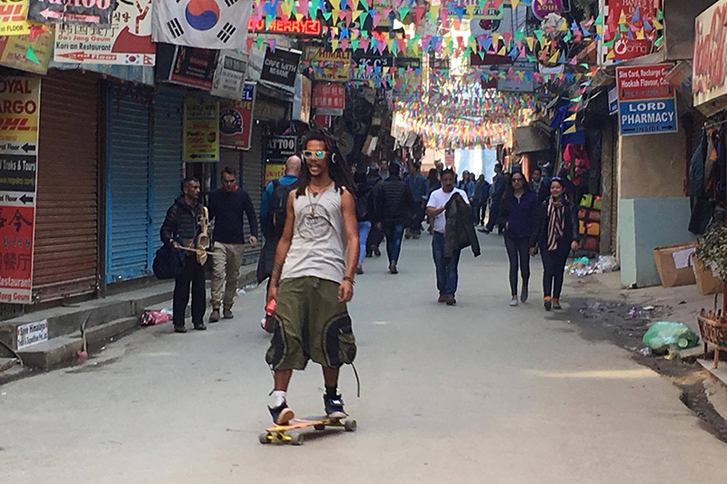 FILE: A tourist is seen skateboarding in Thamel of Kathmandu, on Thursday, December 7, 2017. Photo: Rajesh Gurung