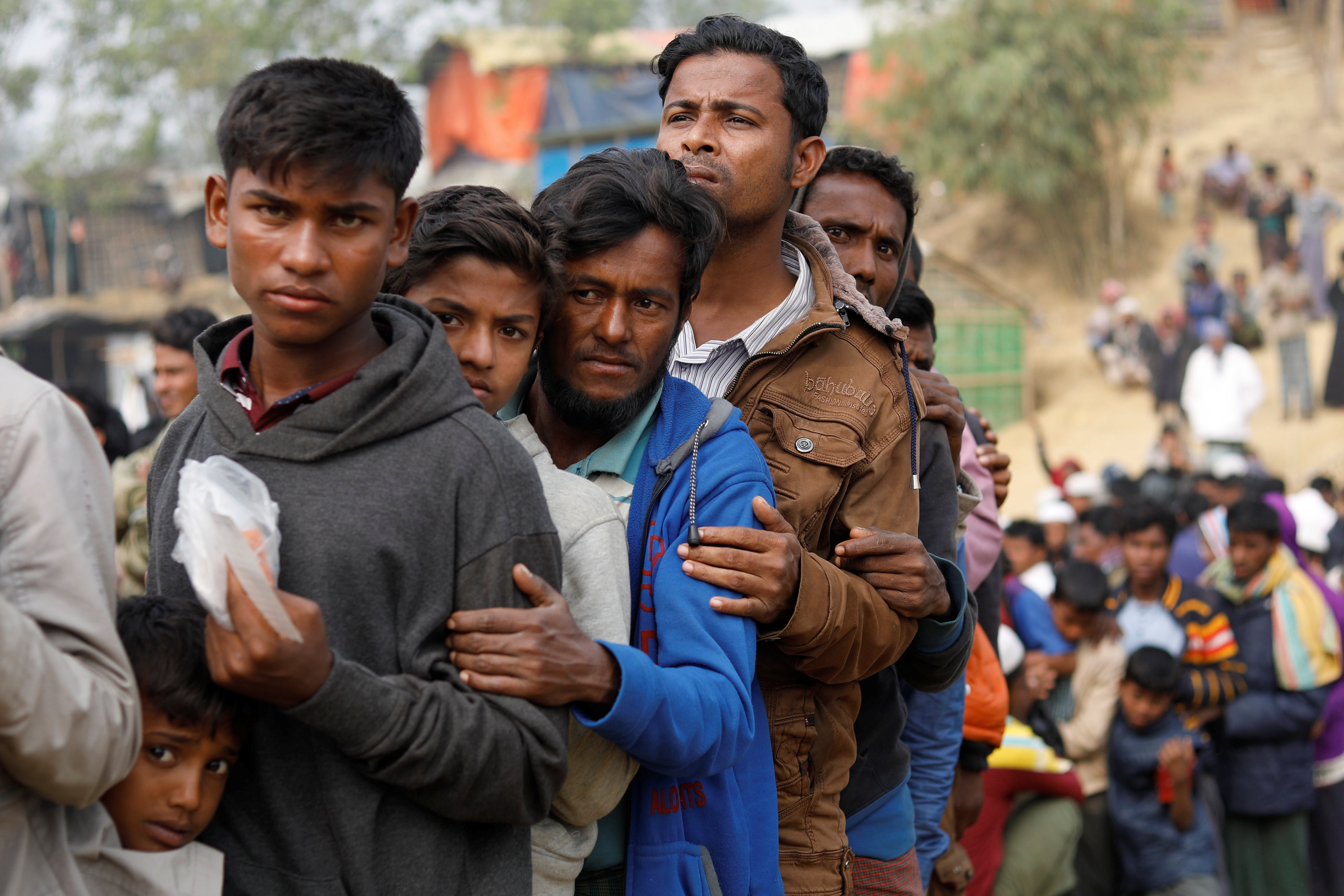 Rohingya refugees line up for daily essentials distribution at Balukhali camp, near Cox's Bazar, Bangladesh January 15, 2018. Photo: REUTERS