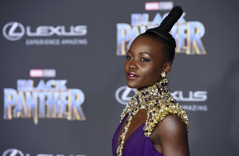 Lupita Nyongu2019o, a cast member in u201cBlack Panther,u201d poses at the premiere of the film at The Dolby Theatre on Monday, Jan. 29, 2018, in Los Angeles. (Photo by Chris Pizzello/Invision/AP)n