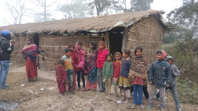 Some students seen outside the school made out of straw and thatched roof on Saturday, January 20, 2018, in Mathiyani Tole, under Jitpur Simara Sub-Metropolitan City-17, Bara district. Photo: Pushparaj Khatiwada