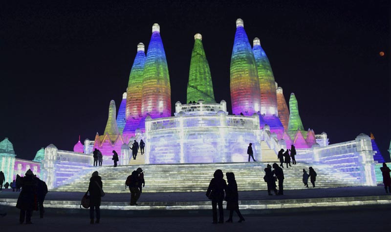 File - Visitors walk among the attractions at the Harbin International Ice and Snow Festival in Harbin in northeastern China's Heilongjiang Province on Jan. 2, 2018. Photo: AP
