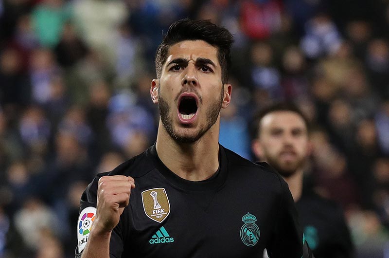 Real Madridu2019s Marco Asensio celebrates scoring their first goal during the Spanish King's Cup quater-final first leg match between Leganes and Real Madrid, at Butarque Municipal Stadium, in Leganes, Spain, on January 18, 2018. Photo: Reuters