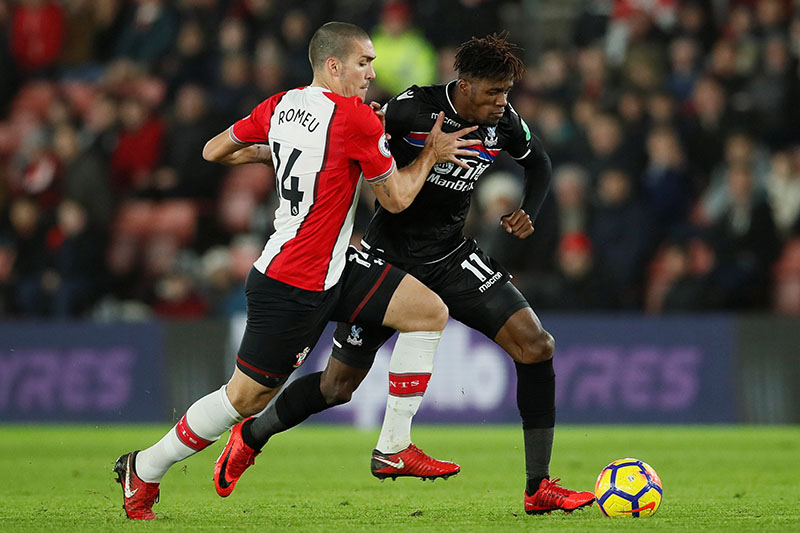 Southampton's Oriol Romeu in action with Crystal Palace's Wilfried Zaha. Photo: Reuters
