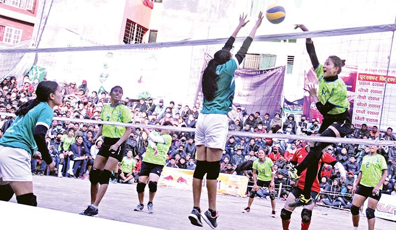 NPC's Kamana Bista jumps for a spike against NDA during their Red Bull Dhorpatan UM Women's Double League Volleyball match in Kathmandu. Photo: THT