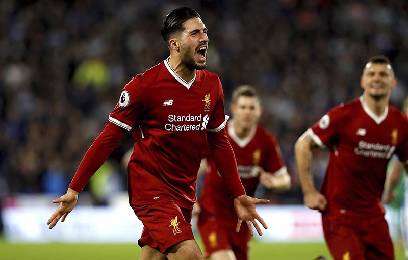 Liverpool's Emre Can celebrates scoring his side's first goal of the game against Huddersfield Town during their English Premier League soccer match at the John Smith's Stadium in Huddersfield, England, on Tuesday January 30, 2018. Photo: Martin Rickett/PA via AP