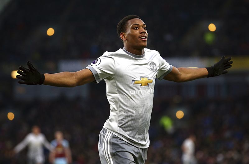 Manchester United's Anthony Martial celebrates scoring his side's first goal of the game during their English Premier League soccer match against Burnley at Turf Moor, Burnley, England, on Saturday, January 20, 2018. Photo: Dave Thompson/PA via AP