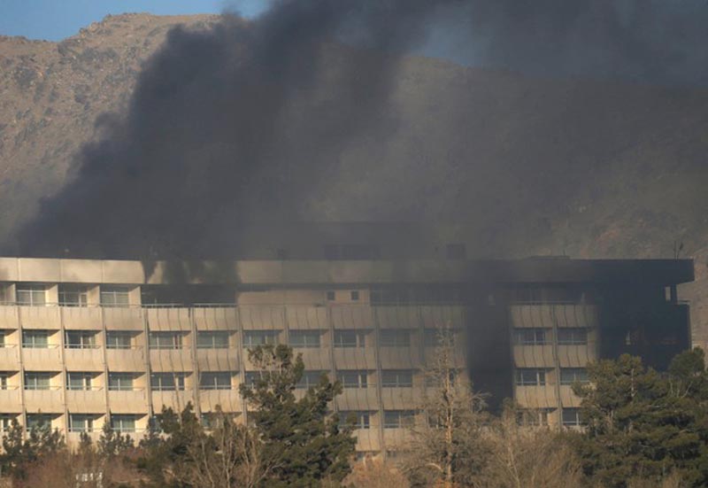 Smoke rises from the Intercontinental Hotel during an attack in Kabul, Afghanistan January 21, 2018.REUTERS/Mohammad Ismail