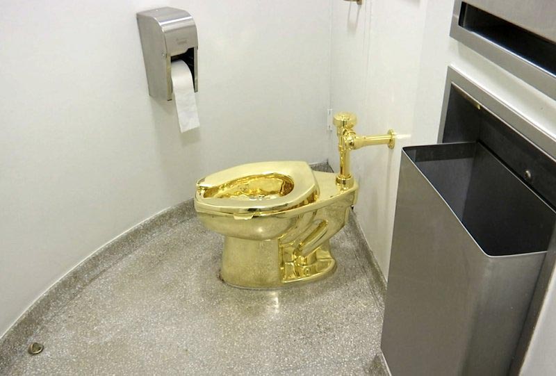 File - This  image made from a video shows the 18-karat toilet, titled u0093America,u0094 by Maurizio Cattelan in the restroom of the Solomon R. Guggenheim Museum in New York on Sept. 16, 2016. Photo: AP