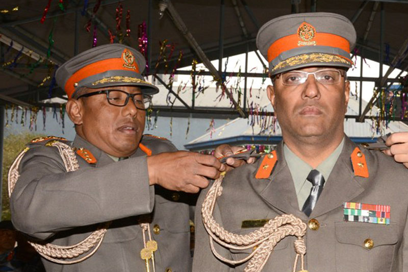 IG of Armed Police Force, Singha Bahadur Shrestha confers insignia to newly promoted AIG at APF's headquarters in Halchowk, on Wednesday, January 31, 2018. Courtesy: APF