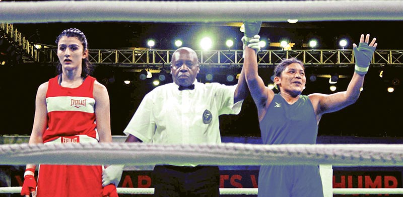 Nepali boxer Punam Rawal (right) is declared the winner in the womenu2019s 64kg weight category quarter-finals of the Indian Open International Boxing Tournament in New Delhi on Tuesday. Photo Courtesy: NSJF