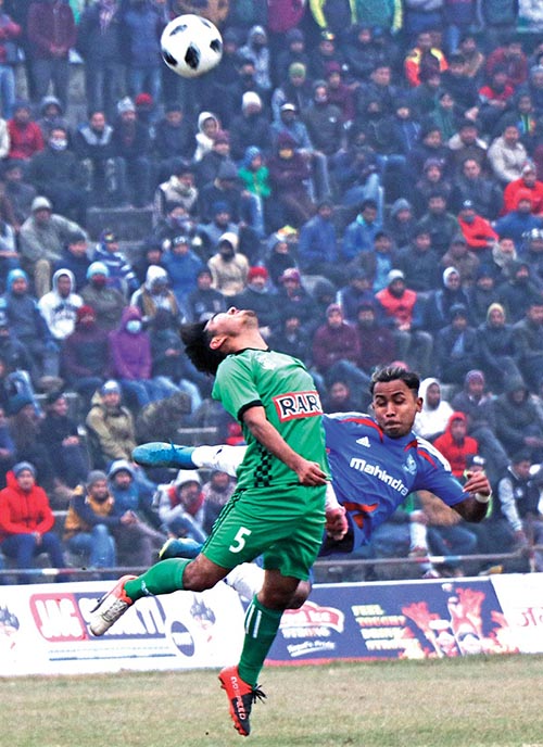 Players of APF (right) and Shara vie for the ball during their Nepal Ice Khaptad Gold Cup match in Dhangadhi on Saturday. Photo: THT
