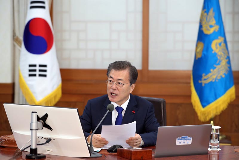 South Korean President Moon Jae-in speaks during a cabinet meeting at the presidential Blue House in Seoul, South Korea, on Tuesday, January, 2018. Photo: Kim Ju-hyoung/Yonhap via AP