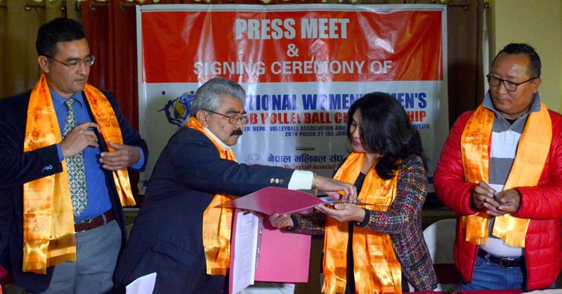 Manoranjan Raman Sharam (left) President of Nepal Volleyball Associtation exchanges MoU with Ashmita Sumargi Chairperson of Nepal Satellite Telecall Pvt, Ltd during signing ceremony of the fourth NVA Men and Women Club Volleyball Championship in Kathmandu on Friday. Photo: THT