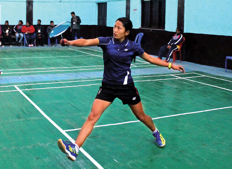 Shova Gauchan returns to Prashunta Khatri during the National Badminton Tournament in Mahendranagar on Tuesday. Photo: THT