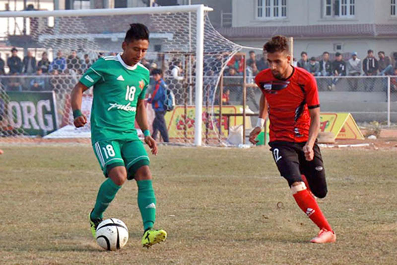 Army's striker Nawayug Shretha tries to dribble against Druk United's player during the Itahari Gold Cup in Itahari of Sunsari, on Monday, January 22, 2018. Courtesy: Santosh Kafle