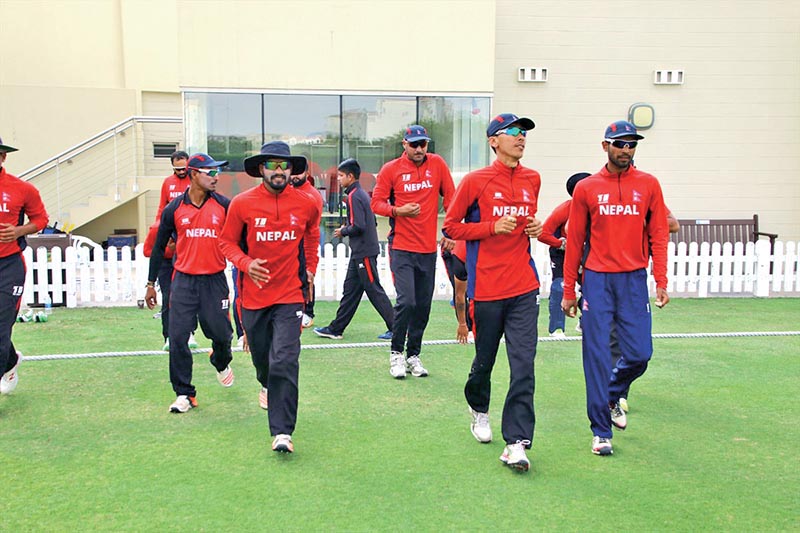 Nepali players enter the pitch to field against UAE u2018Au2019 in a practice match at the ICC Oval Cricket Ground in Dubai on Tuesday. Photo Courtesy: Raman Shiwakoti