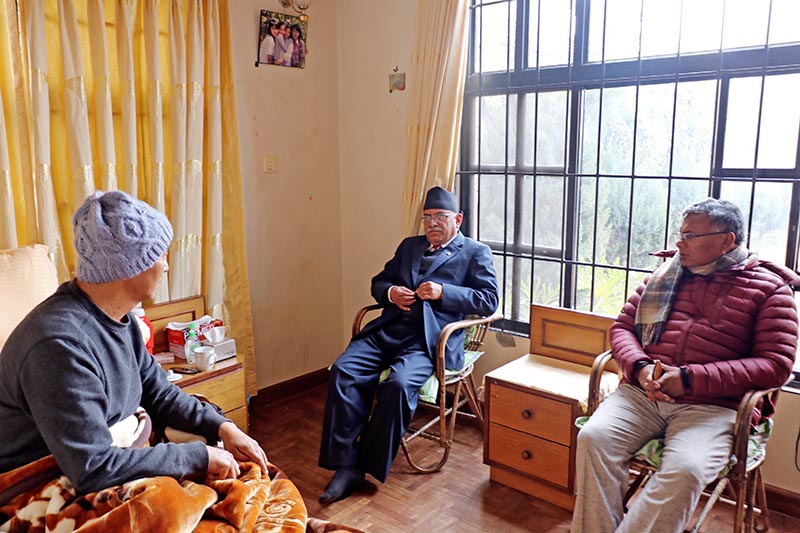 The CPN-Maoist Centre Chairperson Pushpa Kamal Dahal and leader Matrika Prasad Yadav visiting ailing leader Pasang Sherpa, who underwenty heart surgery, at latter's residence in Kathmandu, on Monday, January 01, 2018. Courtesy: CMPrachanda