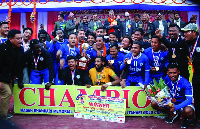 Ruslan Three Star Club team members celebrate after nwinning the Madan Bhandari Memorial Itahari Gold Cup nin Sunsari on Saturday. nPhoto: THT Print 