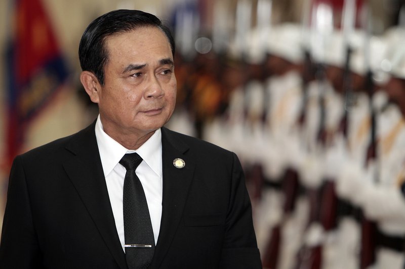 Thailandu2019s Prime Minister Prayuth Chan-ocha reviews the honor guard during a welcome ceremony at the Peace Palace in Phnom Penh, Cambodia. The worldu2019s only nation still under formal military rule, Thailand is under increasing pressure both at home and abroad to return to civilian governance. The message now appears clear: In one form or another, the gruff general wants to be that civilian. 