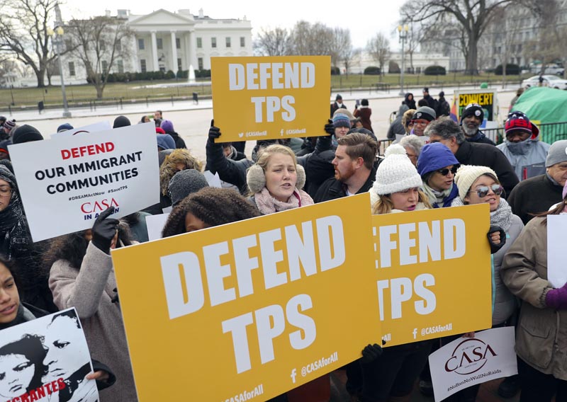 File - CASA de Maryland, an immigration advocacy and assistance organization, holds a rally in Lafayette Park, across from the White House in Washington, on Monday, Jan. 8, 2018, in reaction to the announcement regarding Temporary Protective Status for people from El Salvador. Photo: AP