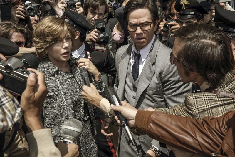 This image released by Sony Pictures shows Michelle Williams, left, and Mark Wahlberg in TriStar Picturesu2019 u201cAll The Money in the World.u201d After an outcry over a significant disparity in pay with Williams, Wahlberg has agreed to donate the $1.5 million he earned for reshoots on the movie to the anti-sexual misconduct initiative Timeu2019s Up, in Williamsu2019 name, announced Saturday, Jan. 13, 2018. (Fabio Lovino/Sony-TriStar Pictures via AP) 