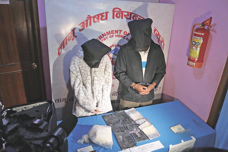 A Thai woman (left) and a Bolivian man held with  cocaine being made public by Narcotics Control Bureau, in Kathmandu, on Friday, January 19, 2018. Photo: THT