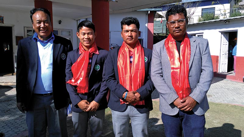 (From left) NGA President Tashi Ghale, Sukra Bahadur Rai, Tanka Bahadur Karki and coach Sanjay Lama before their departure to Dhaka, in Kathmandu on Sunday. Photo: THT
