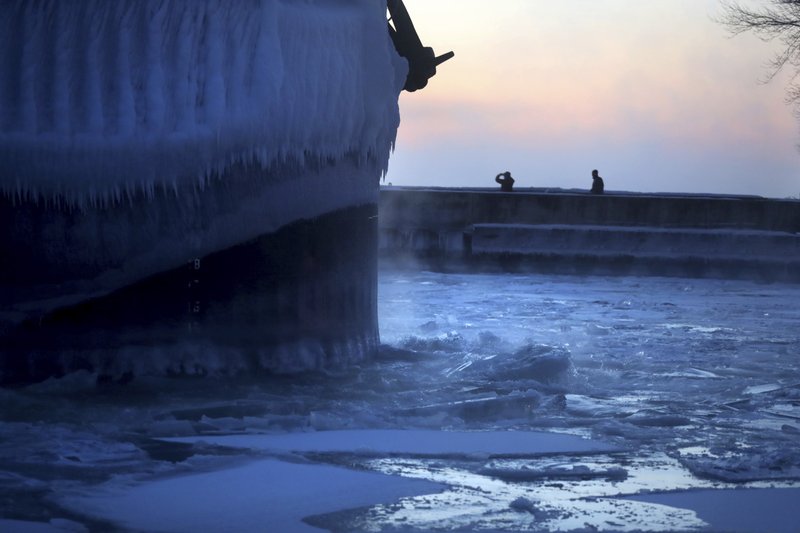 Steam rises from Lake Superior as the ship St. Clair comes to harbor during some of the coldest temps of the year, Sunday, Dec. 31, 2017, at Canal Park in Duluth, Minn. The St. Clair is a self-unloader built in 1976 at Sturgeon Bay, Wis., and is 770 feet long and has 26 hatches that open into 5 cargo holds, providing a load capacity of 45,000 tons.