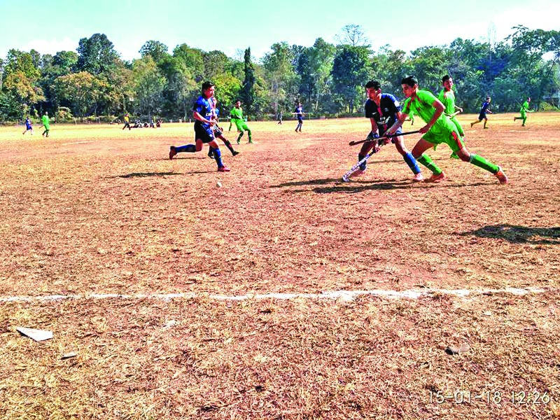 Players in action during the 17th menu2019s and second womenu2019s National Hockey Tournament at the Institute of Forestry grounds in Makawanpur on Monday. Photo: THT Print 