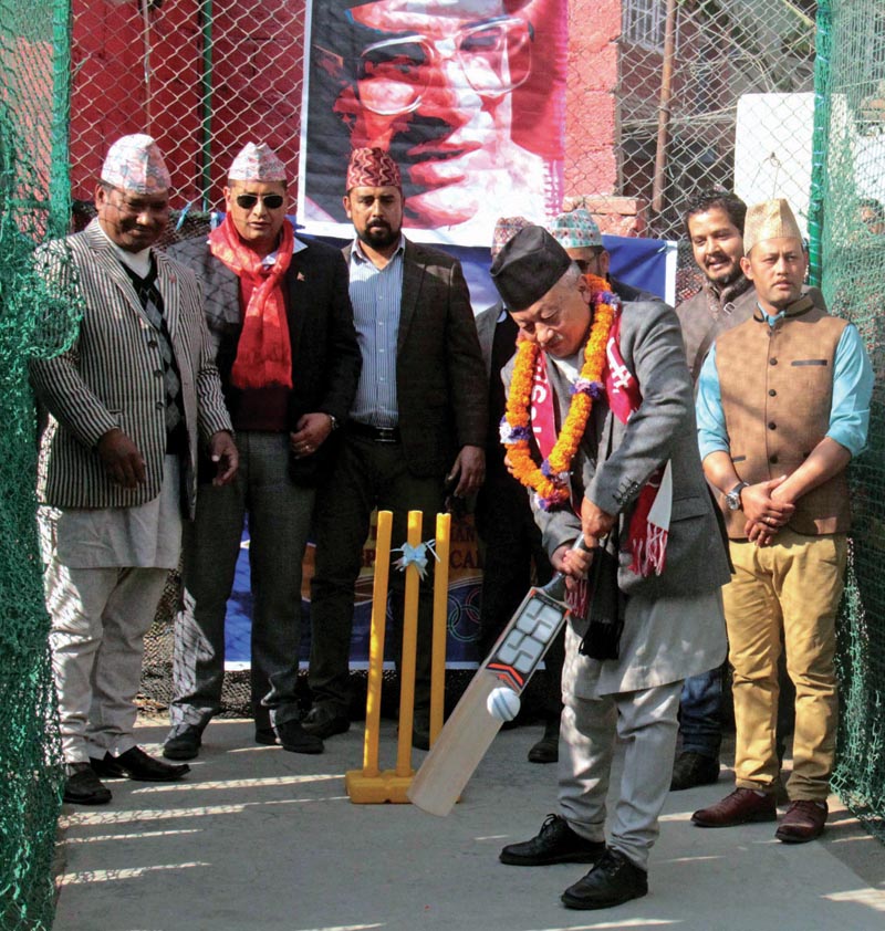Former Speaker of CA Subash Chandra Nembang bats during nthe inauguration of Madan Bhandari Cricket Academy in nBaneshwor on Monday. Photo: THT