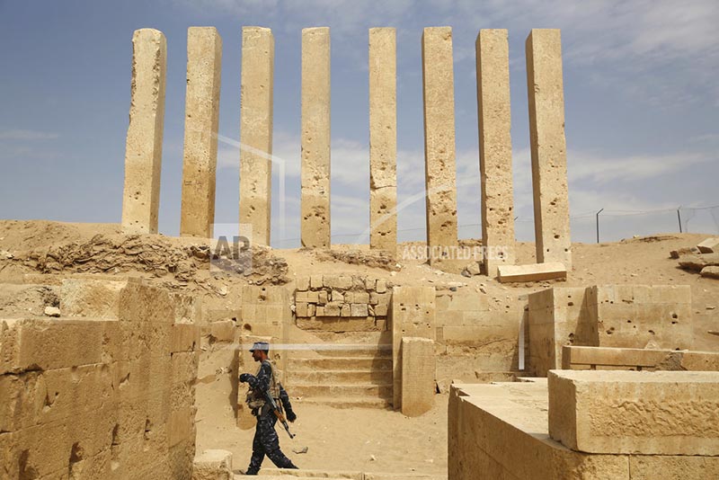 In this Saturday, February 3, 2018 photo, a soldier allied to Yemen's internationally recognised government walks through the Awwam Temple, also known as the Mahram Bilqis, in Marib, Yemen. Photo: AP