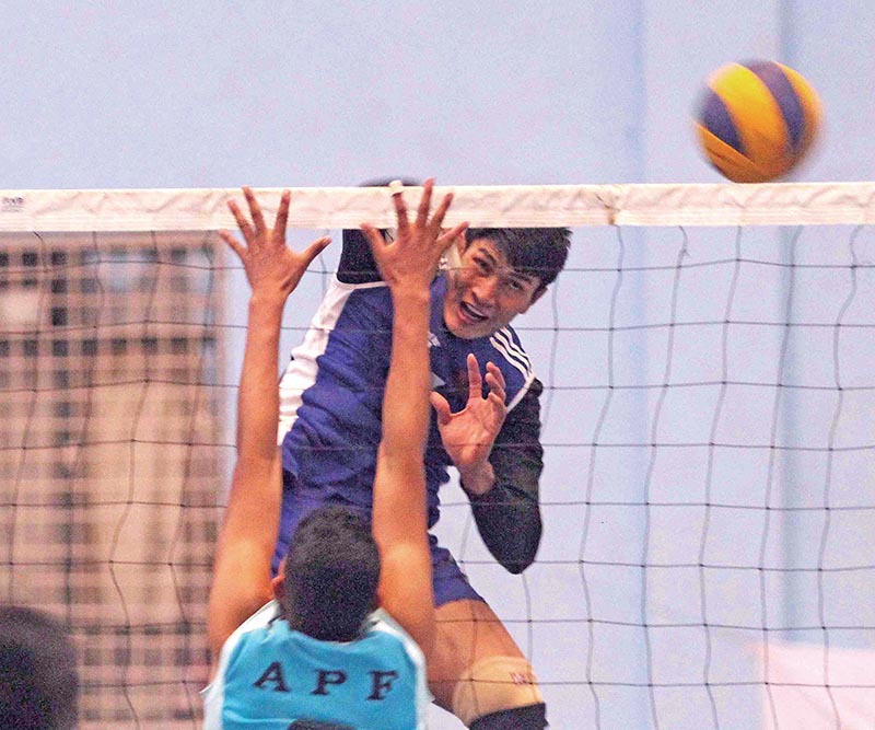TAC's Man Bahadur Shrestha jumps for a spike against Nepal APF Club during their CoAS third National Volleyball Tournament at Army Sports Complex, Lagankhel in Lalitpur on Wednesday. Photo: THT