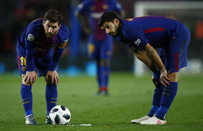 FC Barcelona's Lionel Messi (left), and Luis Suarez during the Spanish Copa del Rey, semifinal, first leg, soccer match between FC Barcelona and Valencia at the Camp Nou stadium in Barcelona, Spain, on Thursday, February 1, 2018. Photo: AP