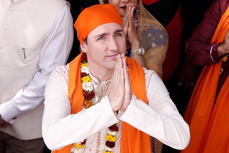 Canadian Prime Minister Justin Trudeau greets the people during his visit to the holy Sikh shrine of Golden temple in Amritsar, India, on February 21, 2018. Photo: Reuters