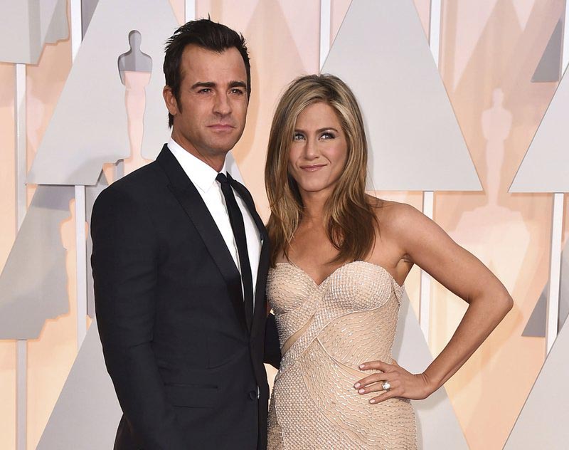File - Justin Theroux, left, and Jennifer Aniston arrive at the Oscars in Los Angeles on  Feb. 22, 2015. Photo: AP