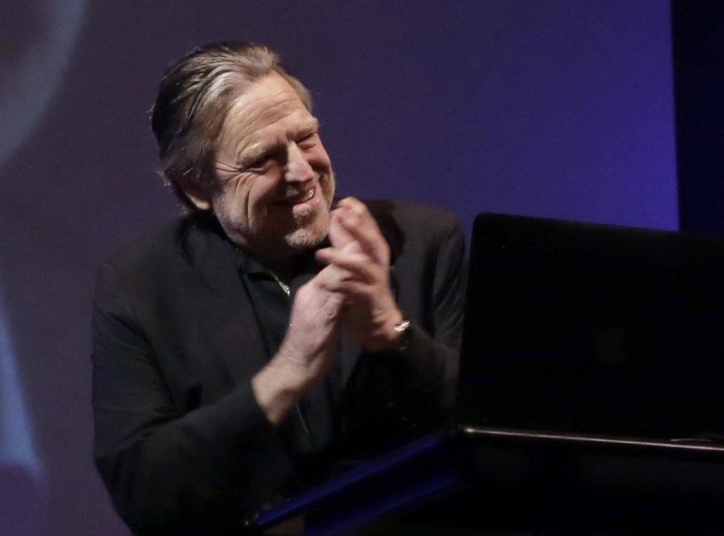 File - Founder of the Electronic Frontier Foundation John Perry Barlow, co-founder &amp; vice chairman of the Electronic Frontier Foundation, communicates with former NSA contractor Edward Snowden via video at the 2014 Personal Democracy Forum, at New York University in New York, on June 5, 2014.