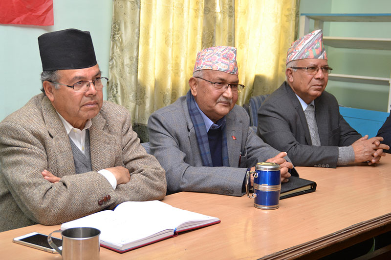UML Chairperson KP Sharma Oli (centre), former Prime Ministers Jhala Nath Khanal (left) and Madhav Kumar Nepal attending Standing Committee Meeting at Party's office in Dhumbarahi, Kathmandu, on Sunday, February 11, 2018. Photo: RSS