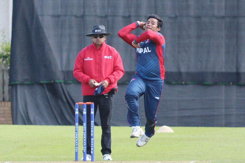 File: Karan KC leaps in to bowl, Scotland v Nepal, ICC World Cricket League Championship, Ayr, July 29, 2015. Photo: Cricinfo.com