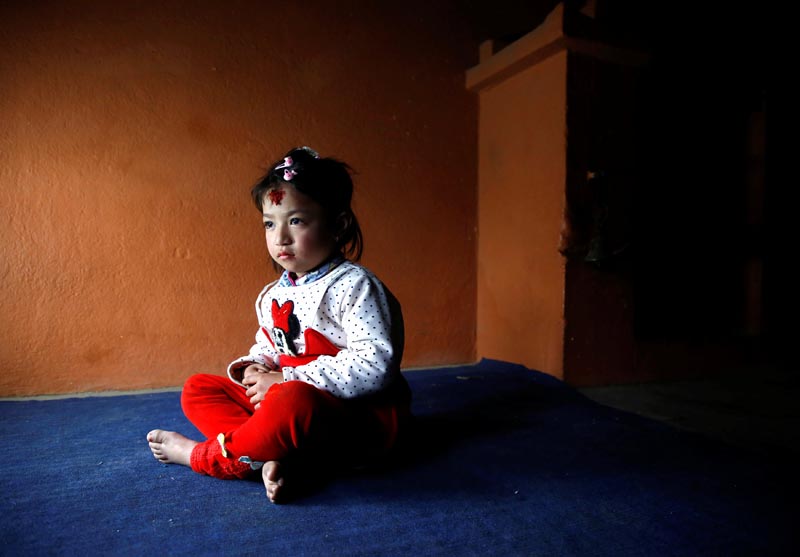Nihira Bajracharya, 5, sits at the Kumari house before being appointed as the Living Goddess Kumari of Lalitpur, February 5, 2018. Photo: Reuters