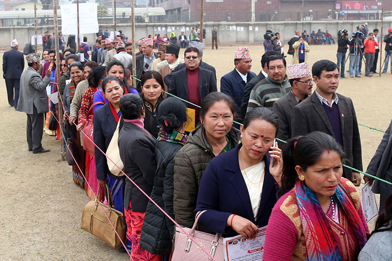 Voters standing in a queue to cast ballot in the NA election of Province 3, in Jawalakhel, Lalitpur, on Wednesday, February 7, 2018. Photo: RSS