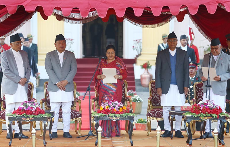 President Bidhya Devi Bhandari administering the oath of office and secrecy to newly-appointed Prime Minister nKP Sharma Oli at Shital Niwas, in Kathmandu, on Thursday, February 15, 2018. Photo: Bal Krishna Thapa/THT