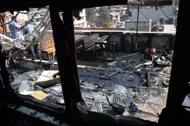 Wreckage at the Share Market building after fire erupted in Putalisadak, Kathmandu, on Monday, February 27, 2018. Photo: THT