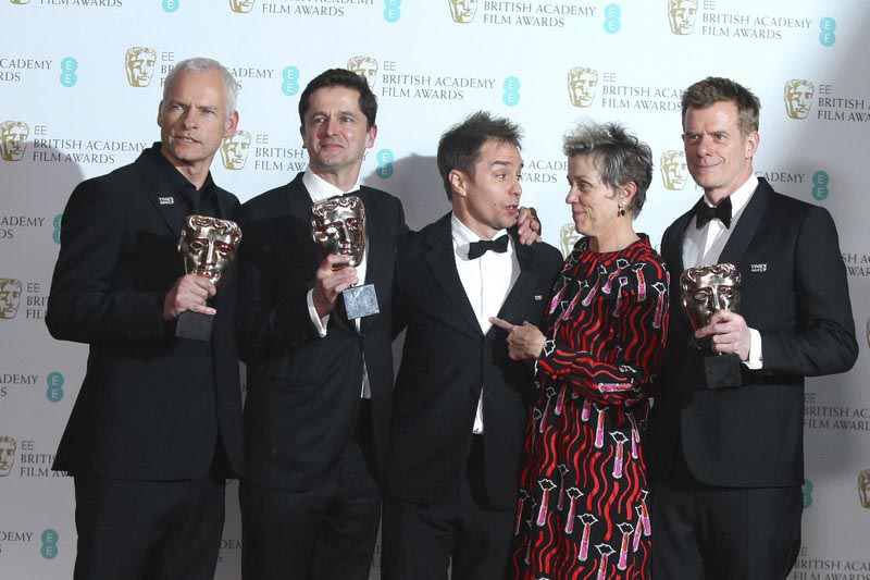 Director Martin McDonagh, from left, producer Peter Czernin, actors Sam Rockwell, Frances McDormand and producer Graham Broadbent pose for photographers backstage with their Best Film awards for u0091Three Billboards Outside Ebbing, Missouriu0092 at the BAFTA 2018 Awards in London, on Sunday, Feb. 18, 2018. Photo: AP