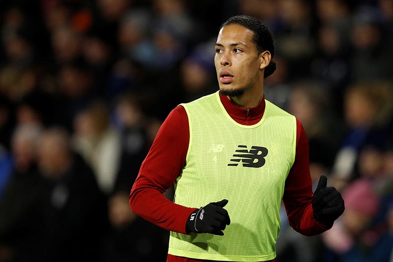 Liverpool's Virgil van Dijk warms up. Photo: Reuters