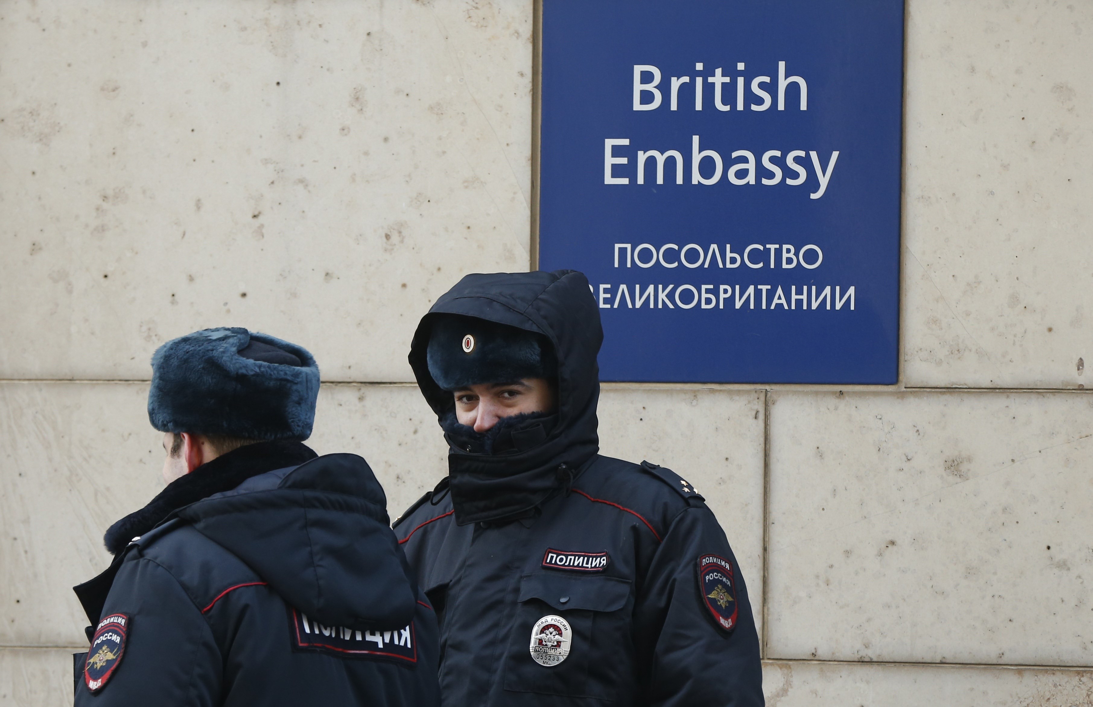 Russian policemen walk outside the British embassy in Moscow, Russia, March 17, 2018. REUTERS/David Mdzinarishvili