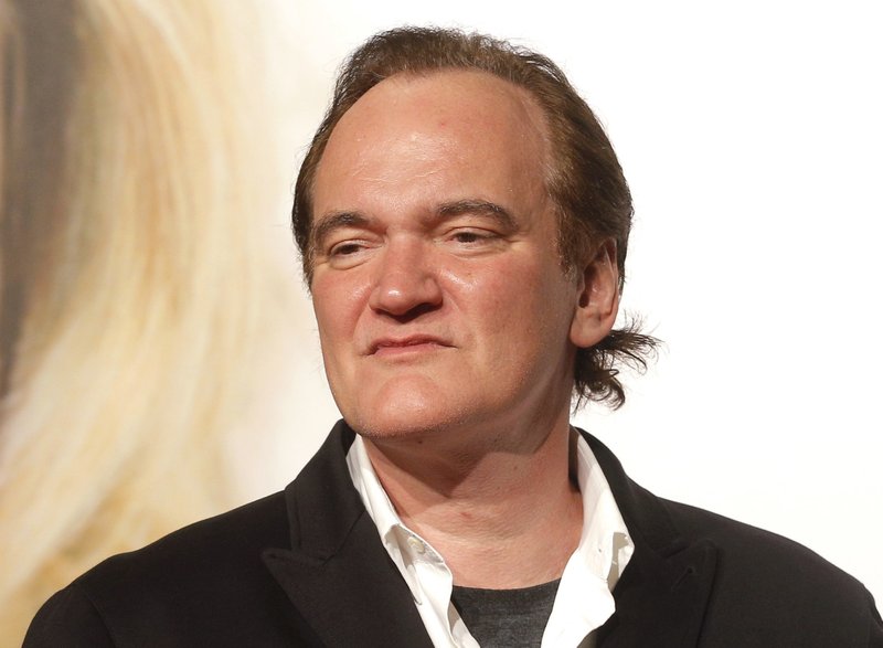 director Quentin Tarantino appears at the opening ceremony of the eighth Lumiere Festival, in Lyon, central France. Brad Pitt and Leonardo DiCaprio are set to star in Tarantinou2019s u201cOnce Upon a Time in Hollywood.u201d Sony Pictures said Wednesday, Feb. 28, 2018, that the film has been dated for a theatrical release on Aug. 9, 2019.