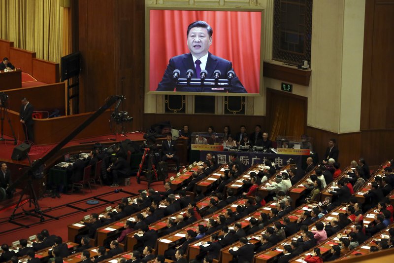 Chinese President Xi Jinping is displayed on a big screen as he delivers a speech at the closing session of the annual National Peopleu2019s Congress in the Great Hall of the People in Beijing, China, Tuesday, March 20, 2018. Photo: AP