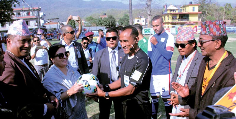 President Bidhya Devi Bhandari handing over match ball to referee during the inauguration of third Madan Bhandari International Gold Cup in Butwal on Friday, March 23, 2018. Photo: THT