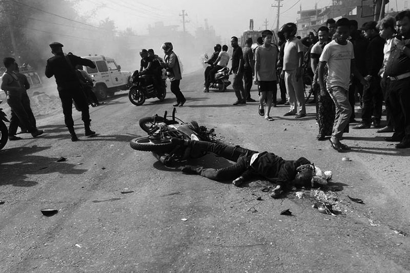 A motorcyclist laying motionless after hit by a tripper truck along Birgunj-Pathalaya road section in Jeetpur Simaraha Sub-Metropolitan City, on Friday, March 23, 2018. Photo: Puspa Raj Khatiwada