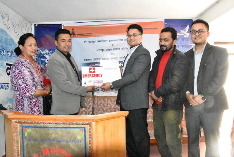 An agreement to provide emergency health servide made between Bhaktapur Tourism Development Committee and Ibamura hospital during press-meet held in Kathmandu. Photo: Sushil Bandu Thapa.